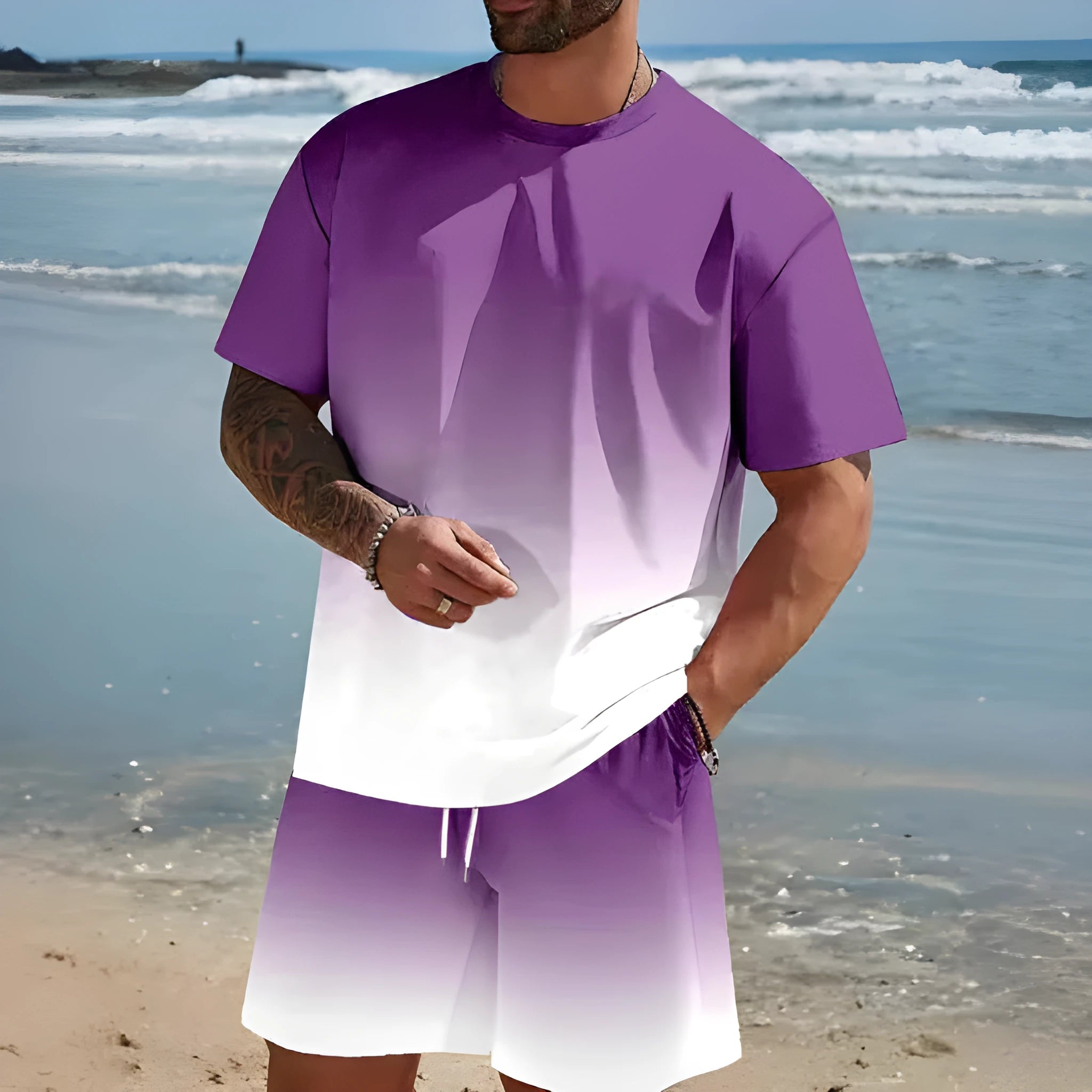 Man wearing a loose fit short sleeve t-shirt and shorts set in a solid colour for summer.