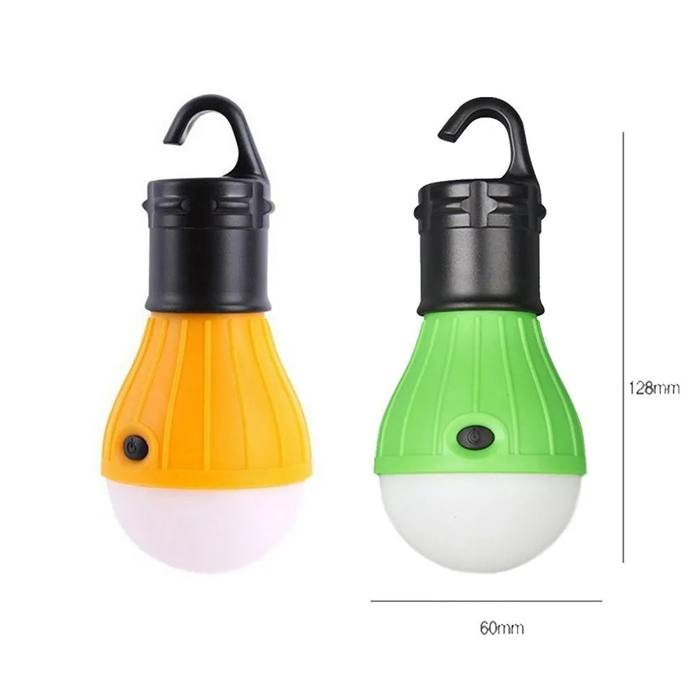 Blue portable LED camping light with a hanging hook, showing scale against a ruler.