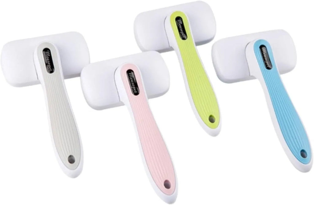 Blue automatic pet hair removal comb for dogs and cats on a table.
