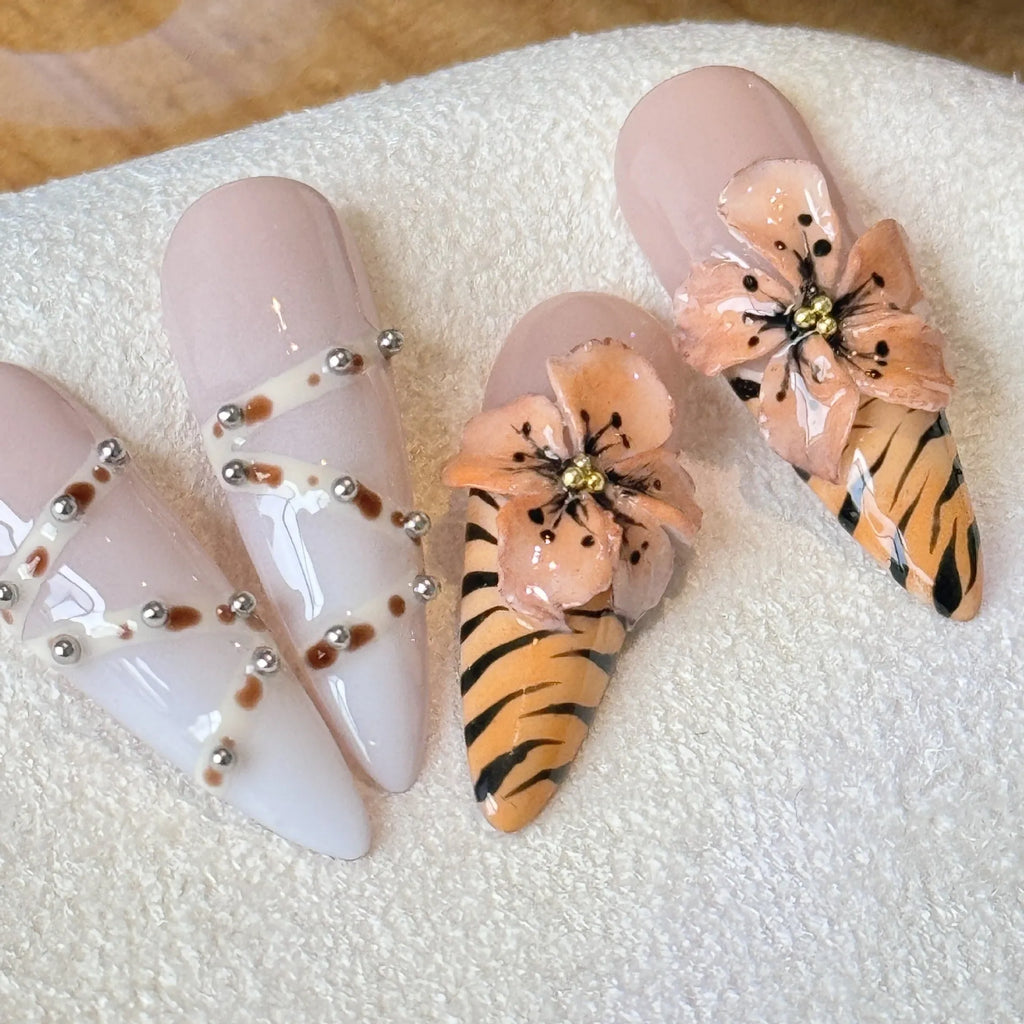 Handmade French style artificial nails with leopard print, cross and flower patterns in four sizes XS, S, M, L.
