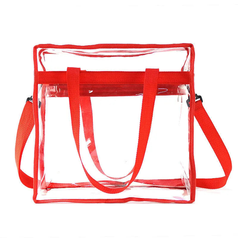 Women's transparent PVC messenger bag with crossbody strap and three-dimensional front pocket.