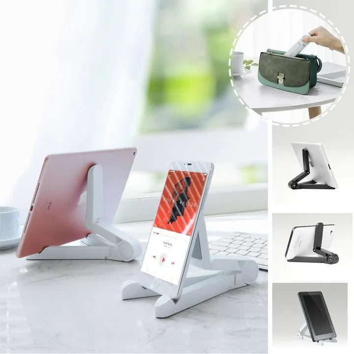 Black foldable tablet holder standing upright with a tablet device resting on its non-slip rubber surface.