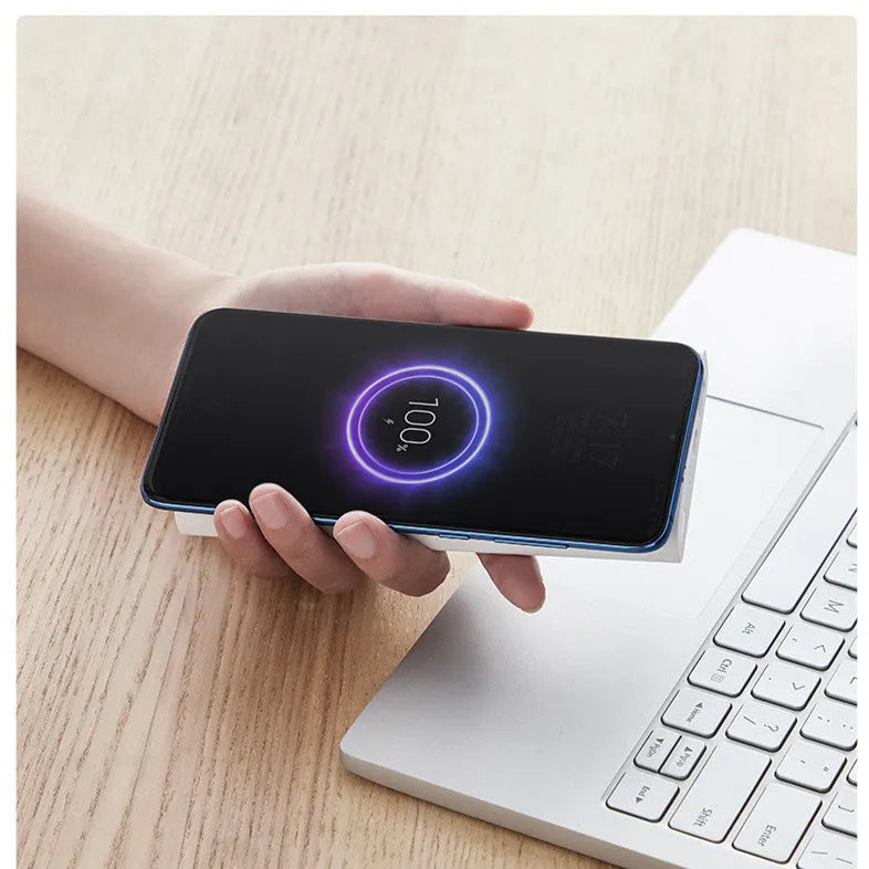 Black and white 10000mAh power bank with wireless charging and USB Type-C port