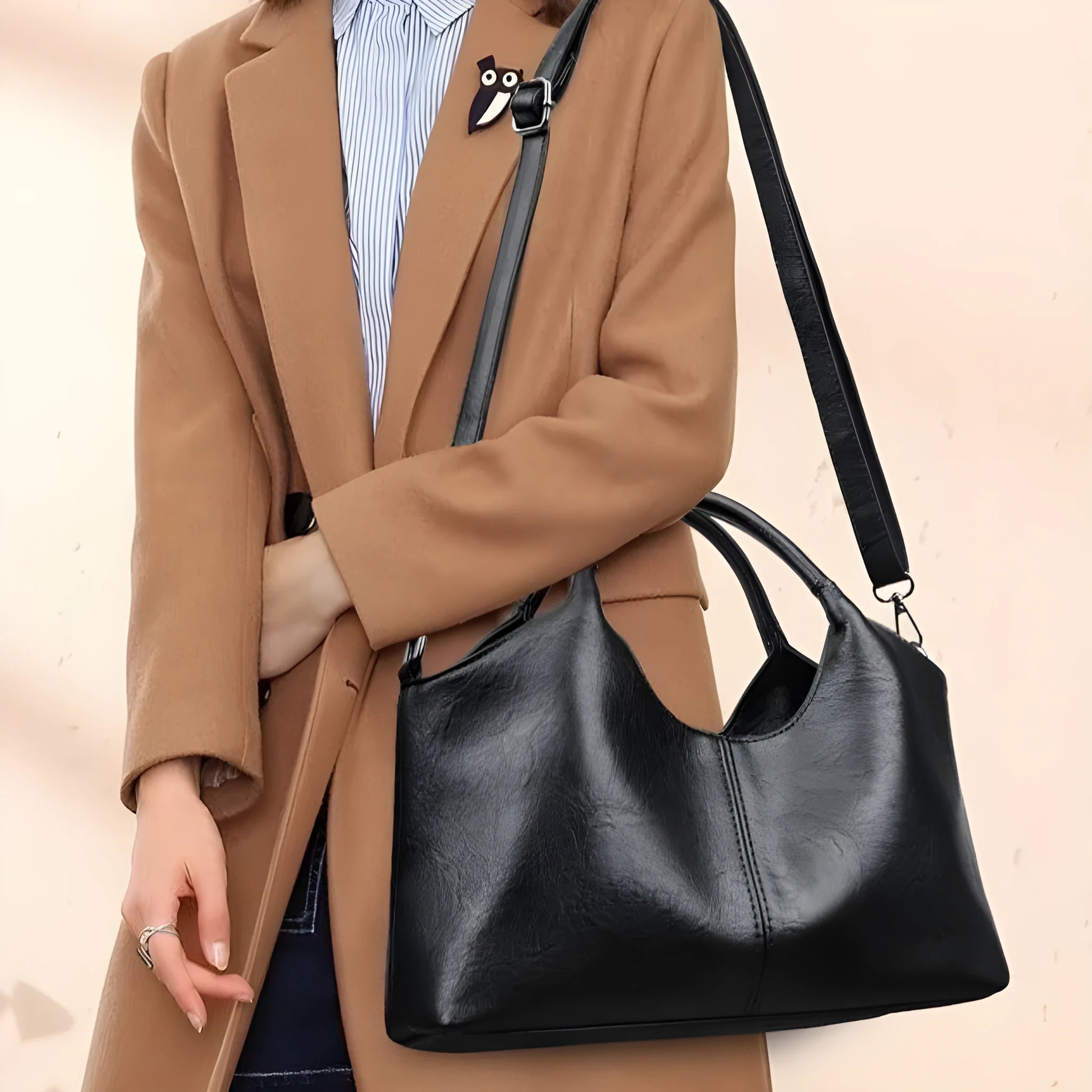 Genuine leather women's cross-body bag in black with soft texture and large capacity design