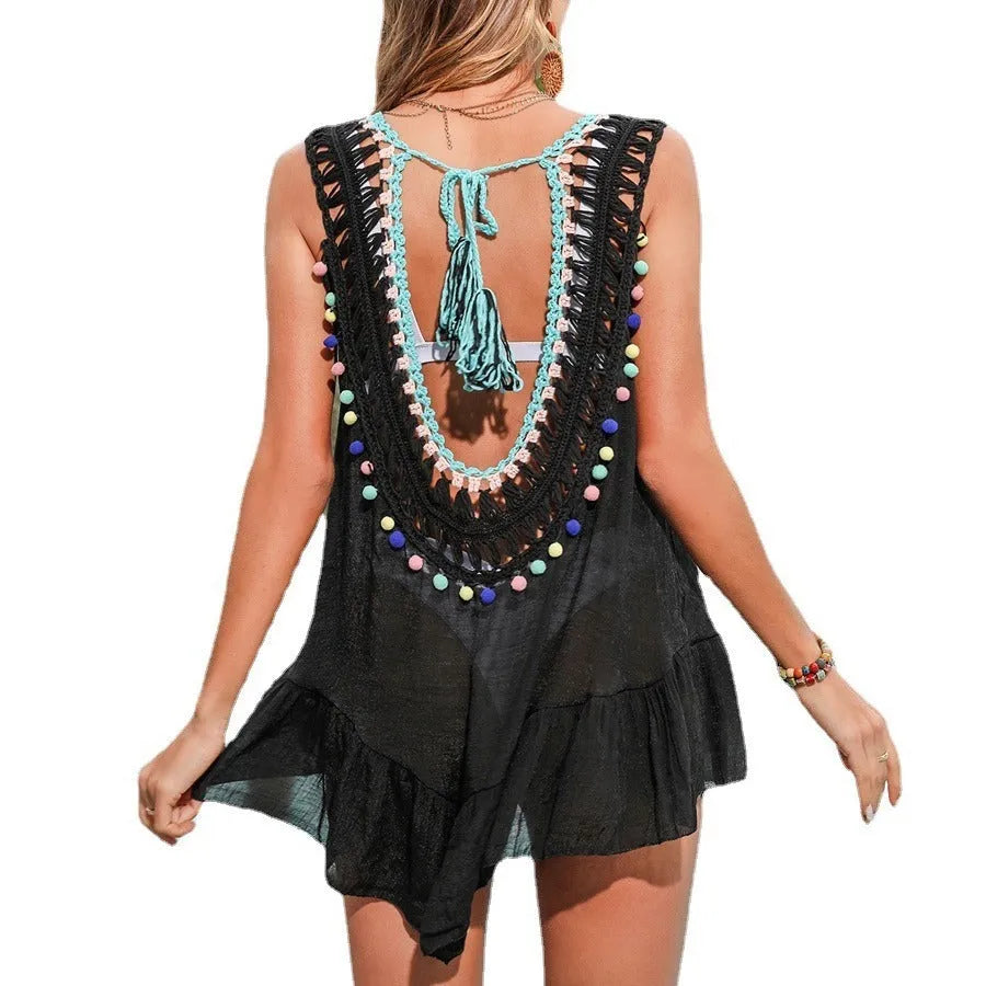 Black hand-crocheted beach cover-up vest with cut-out design and ruffled hem for women's swimming and vacation wear