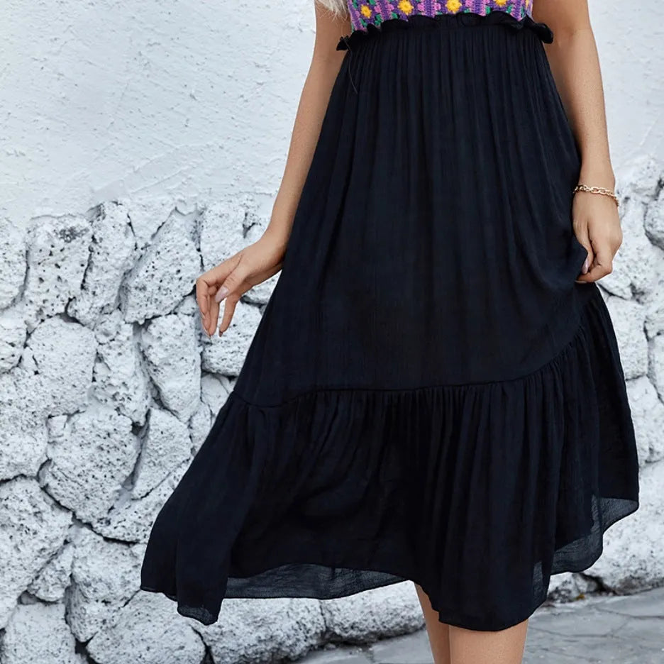 Purple women's sleeveless dress with detailed hand-hooked white floral embroidery on the skirt.