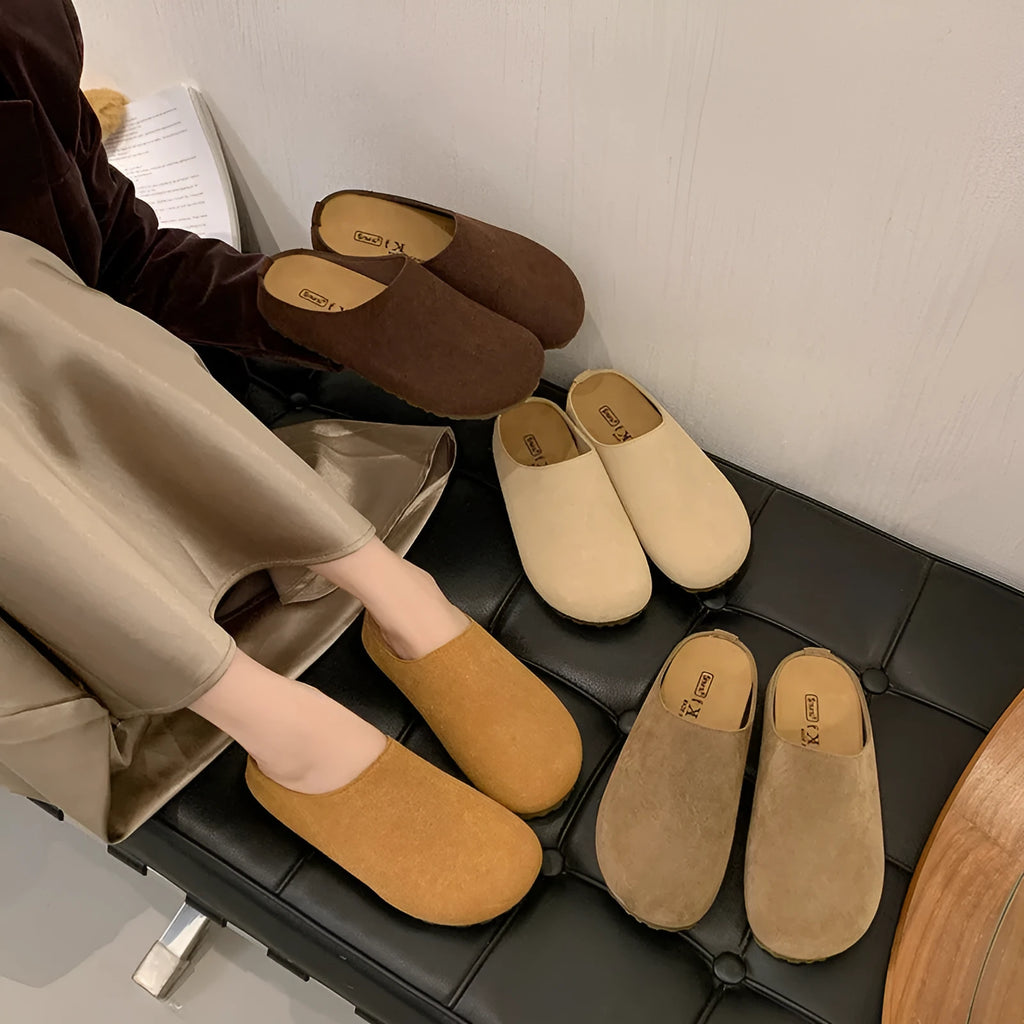 Soft flat slip-on slippers in apricot colour with square toe and microfibre upper.