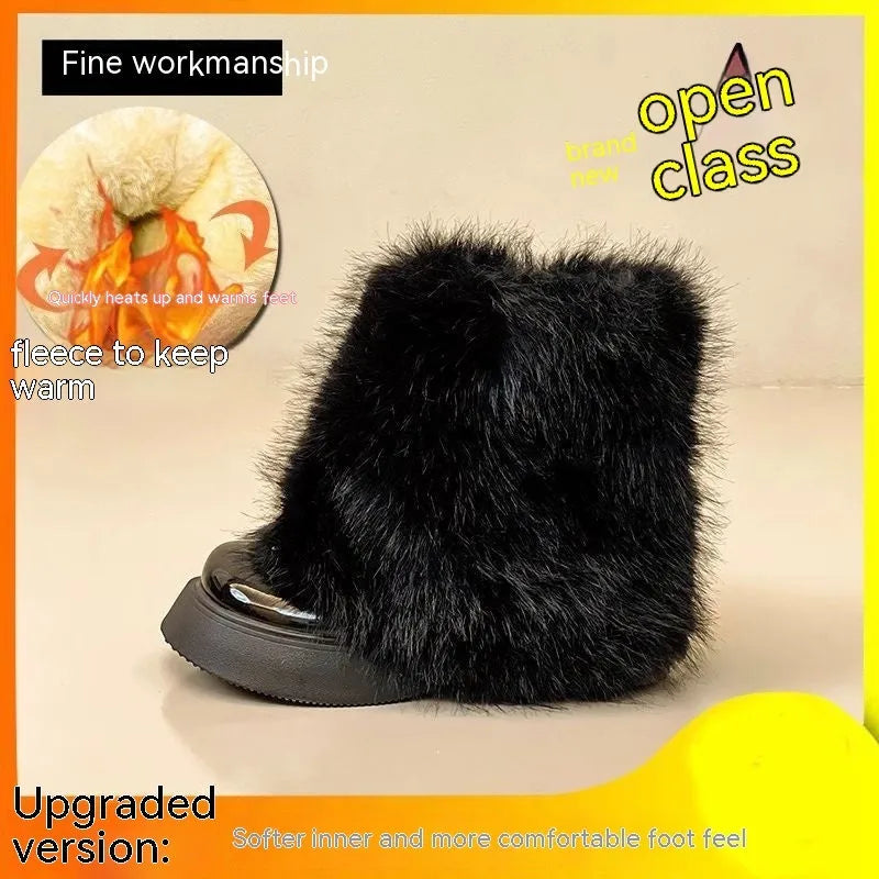 Women's black fleece-lined snow boots with rubber sole and mid heel