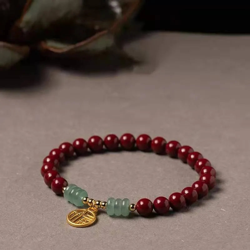 Handmade gold cinnabar wave bracelet with copper beads in national style unisex design.