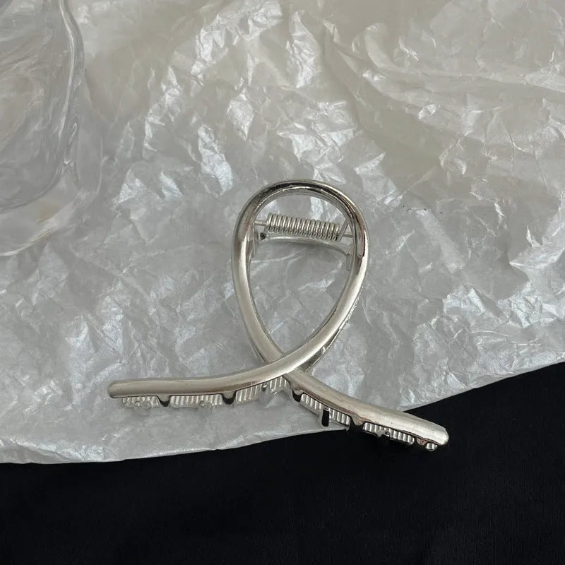 Silver metal hair barrette claw clip with electroplated finish and decorative design