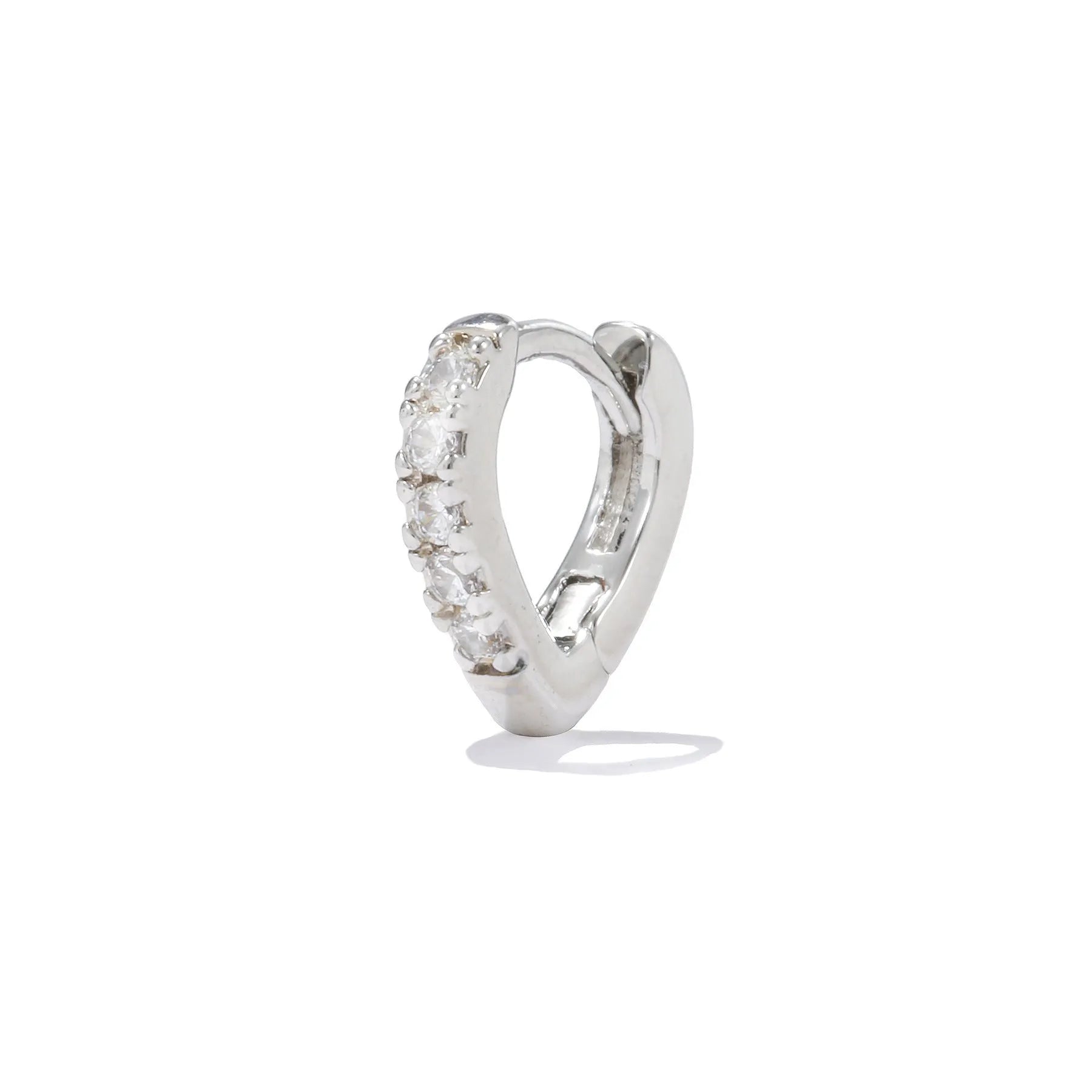 Simple geometric copper ear clip with heart design in gold or white finish.