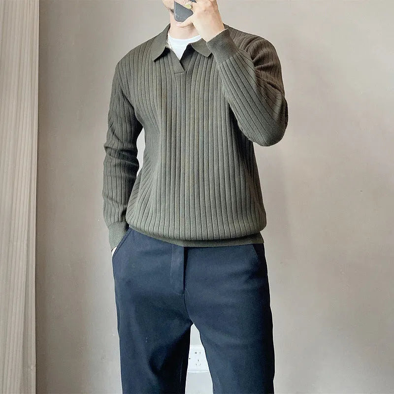 Man wearing a loose-fit Army Green knitted pullover sweater with long sleeves.