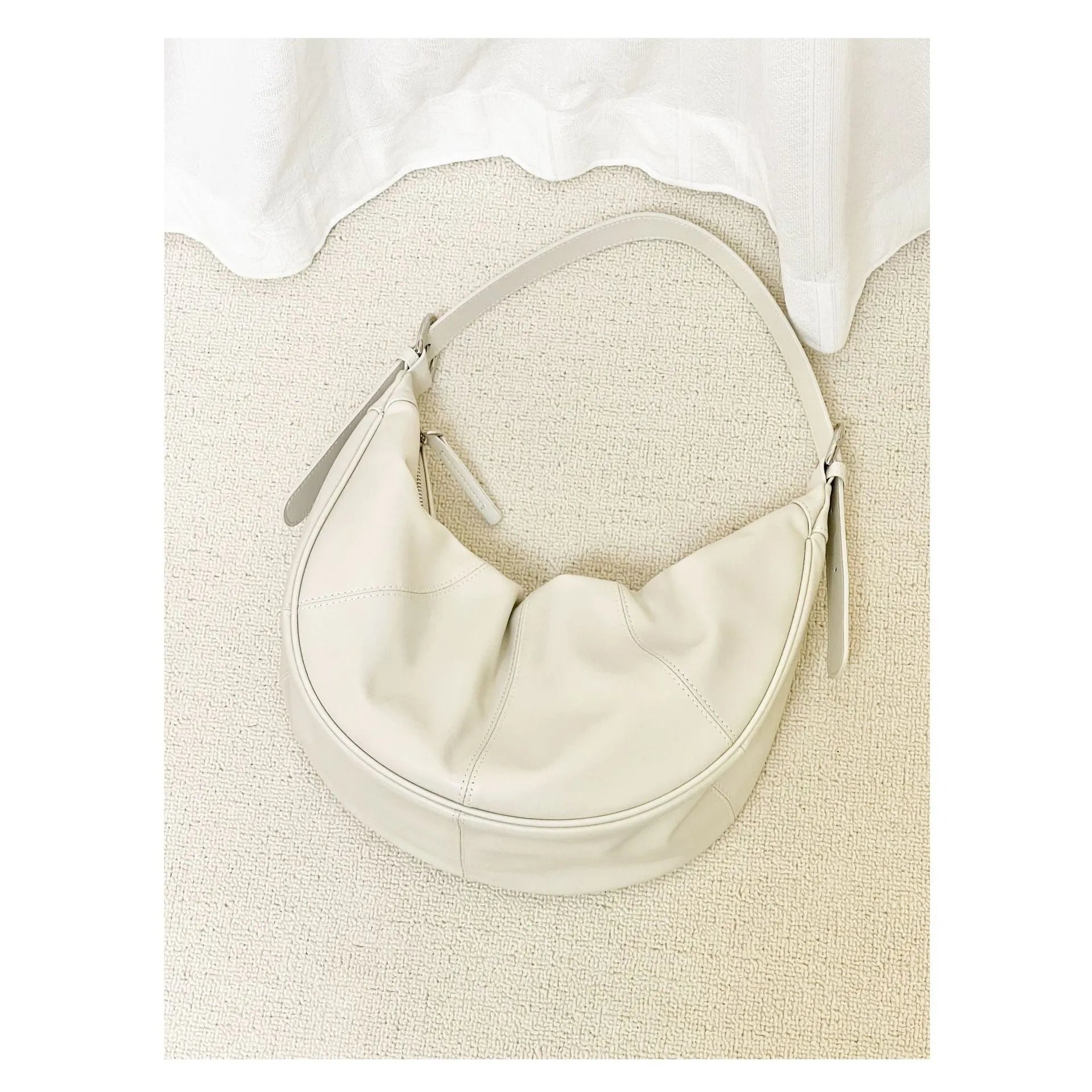 Women's dumpling-shaped shoulder bag in genuine first layer cowhide leather with cotton lining and sandwich pockets
