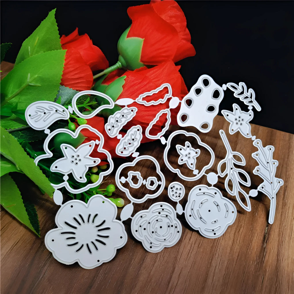 Silver carbon steel flower paper cutting knife mould measuring 14.3 by 9.9 cm