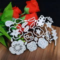 Silver carbon steel flower paper cutting knife mould measuring 14.3 by 9.9 cm