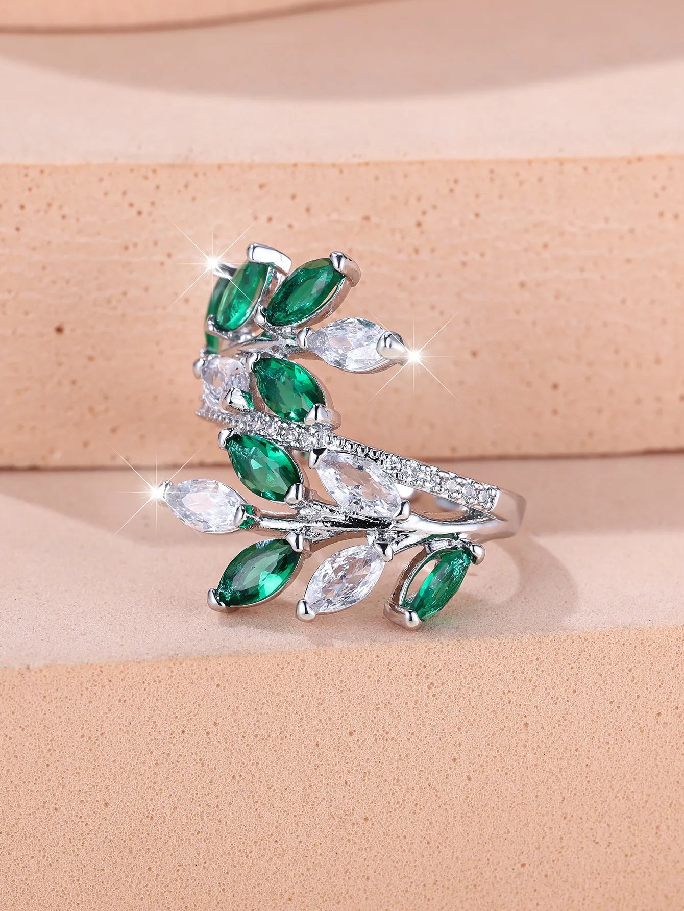 Adjustable copper leaf ring with a horse eye zircon stone in a choice of nine colour finishes.