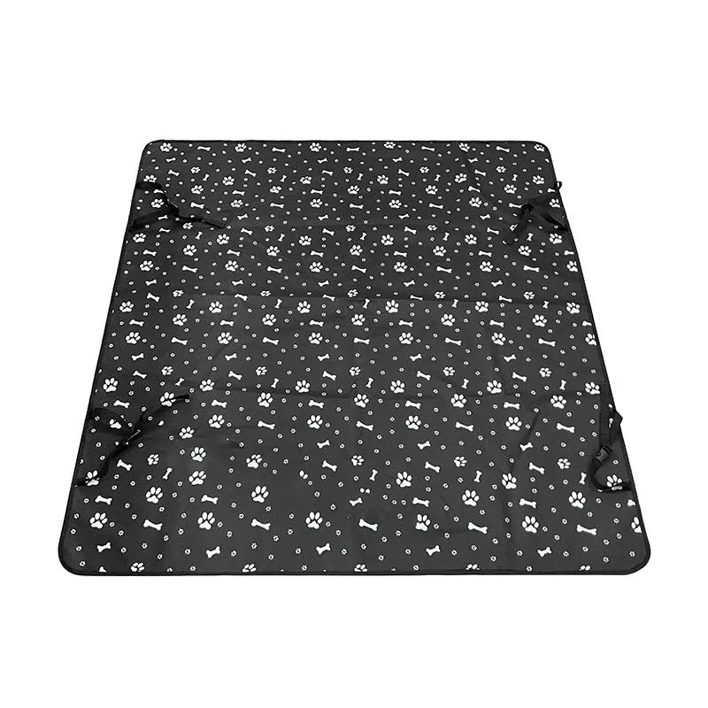 Washable cloth car pet mat for rear seat protection with dog bone print design.