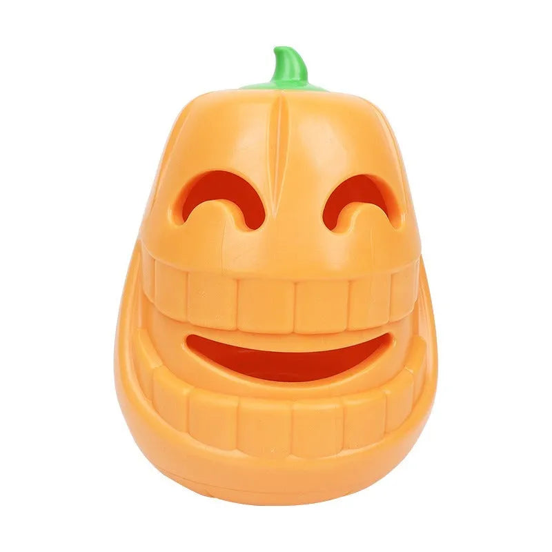 Halloween pumpkin shaped orange interactive dog chew toy with treat-dispensing funnel