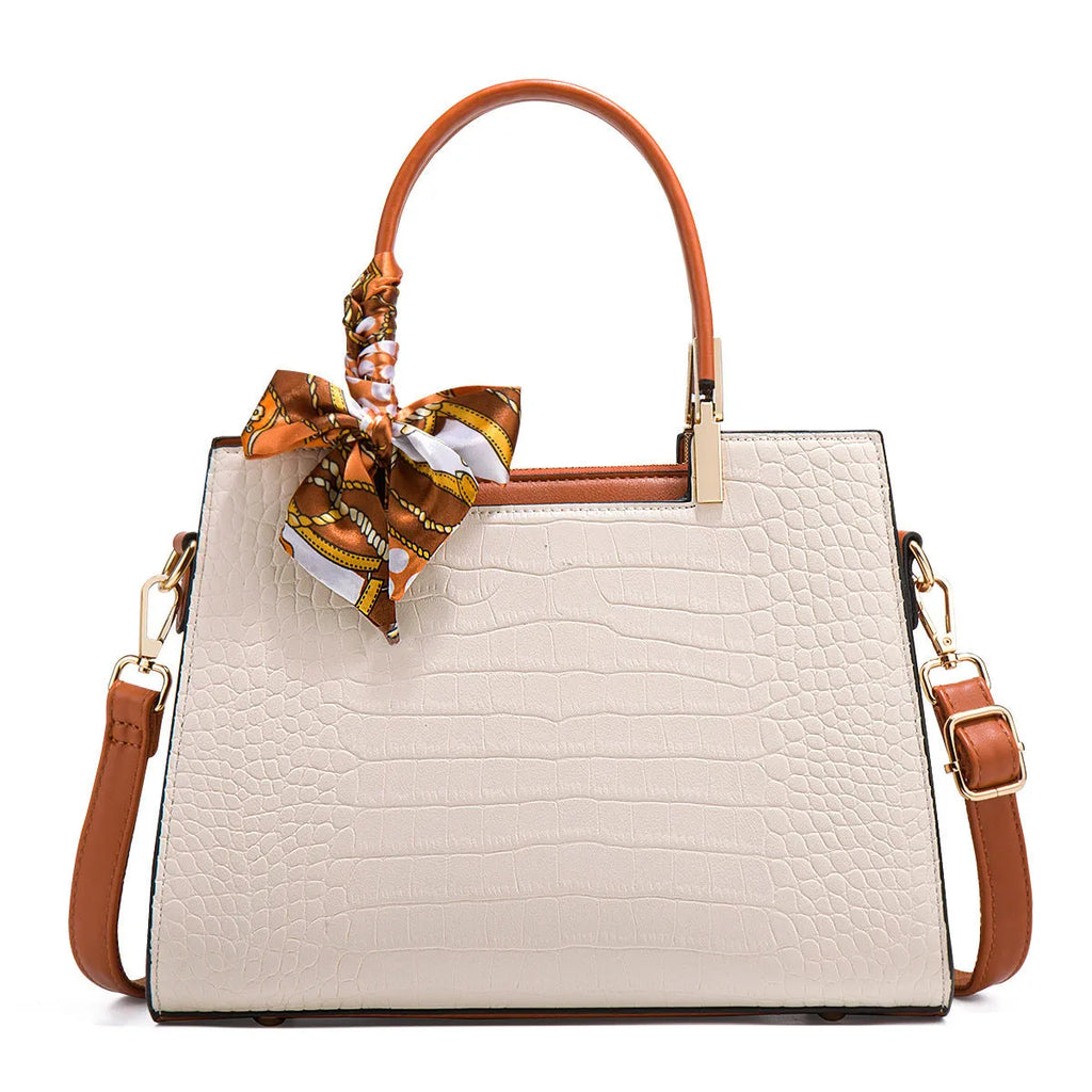 Milky white PU shoulder handbag with horizontal square shape and internal organisational compartments