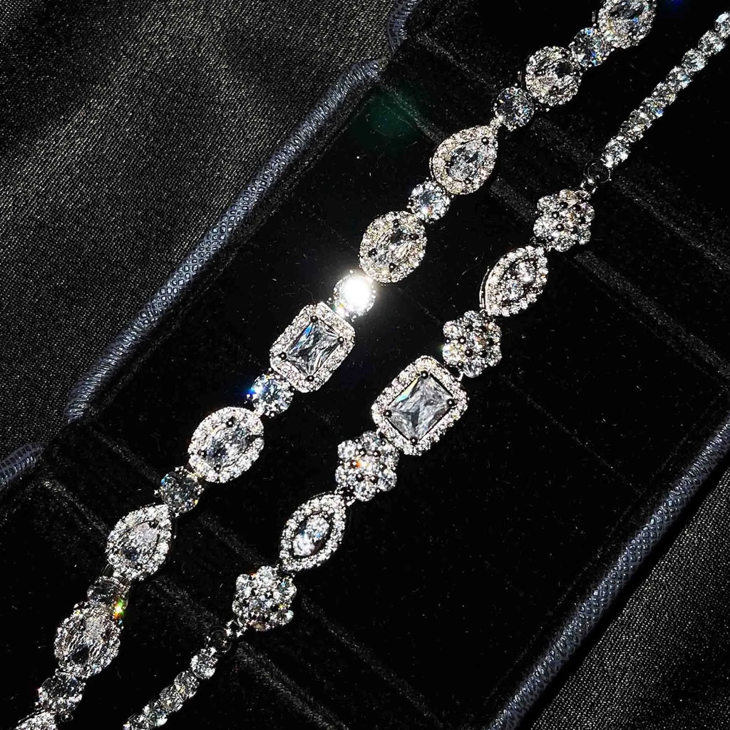 Women's white gold plated geometric bracelet with zircon stones in two length options.