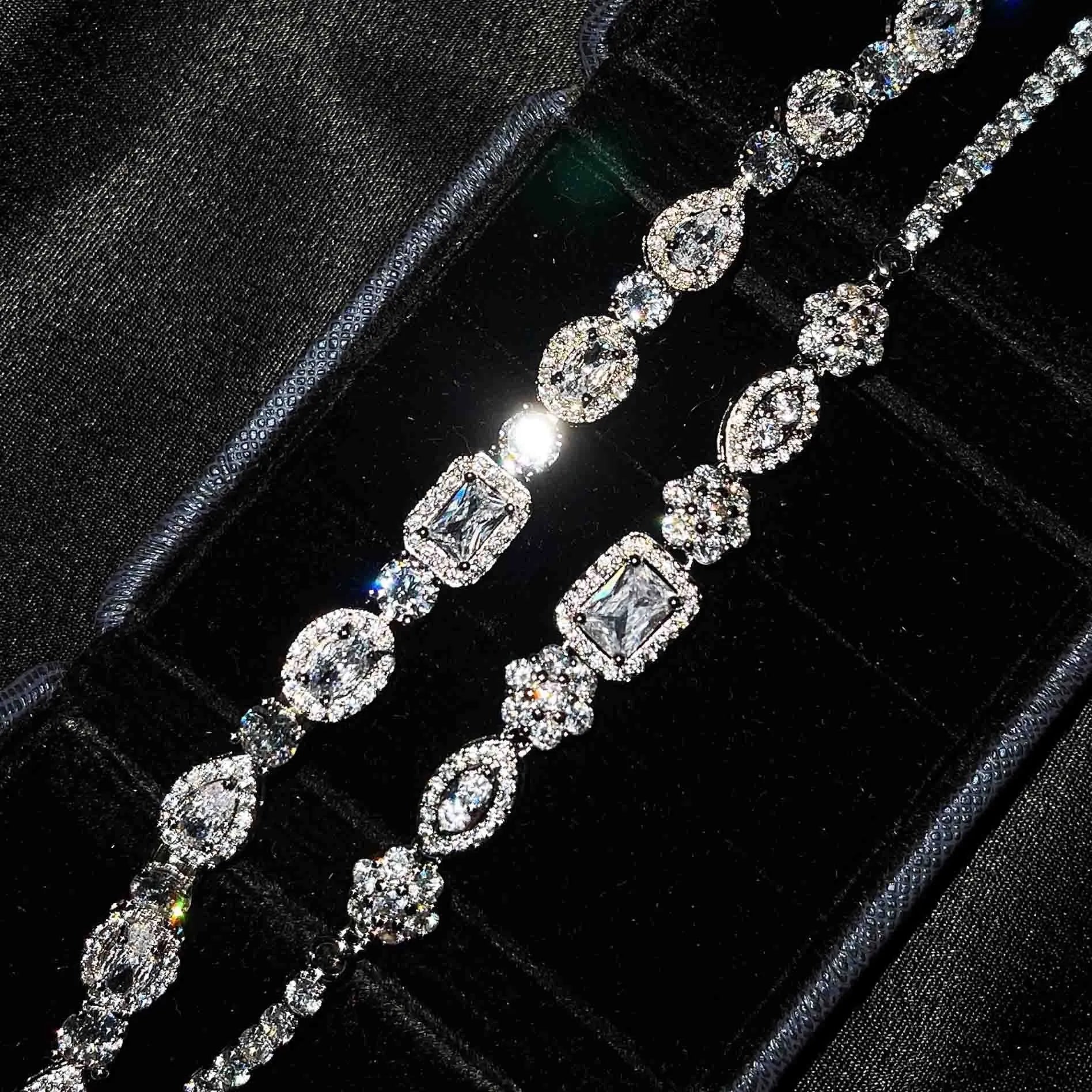 Women's white gold plated geometric bracelet with zircon stones in two length options.