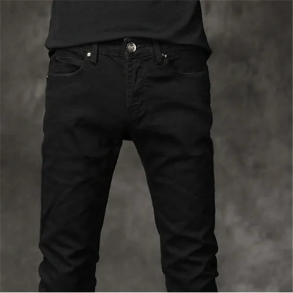 Slim-fit stretch cotton men's pants in black, laid flat showing tight cut and full length