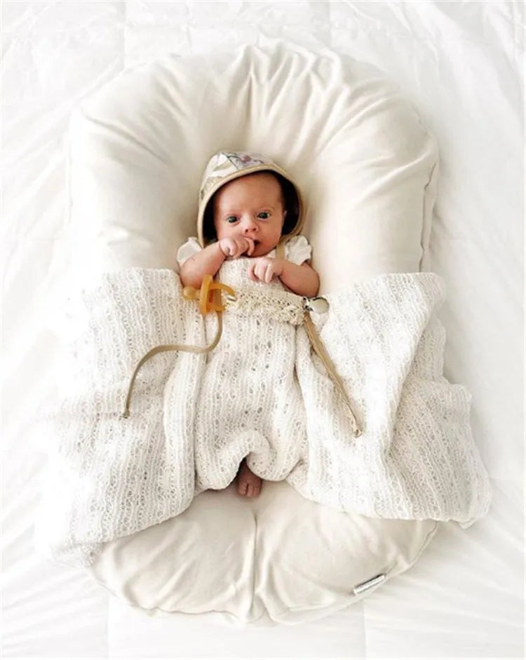 Portable baby nest crib measuring 75x45cm in cotton with PP cotton filler
