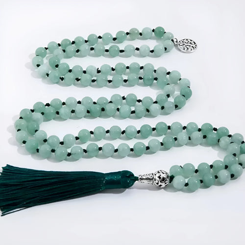 Handmade knotted beaded necklace with stone pendant showing 108 beads and geometric design