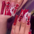 Sweet flower pattern fake nails with prismatic red diamond accents, jelly glue and nail file