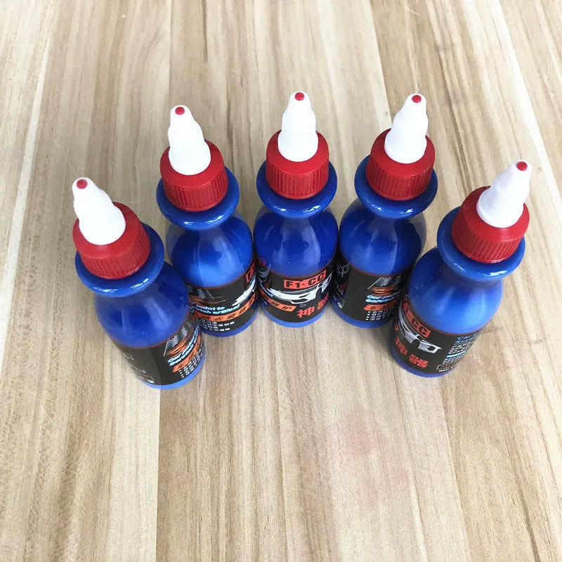 Blue automotive scratch repair agent with applicator sponge for car paint damage restoration