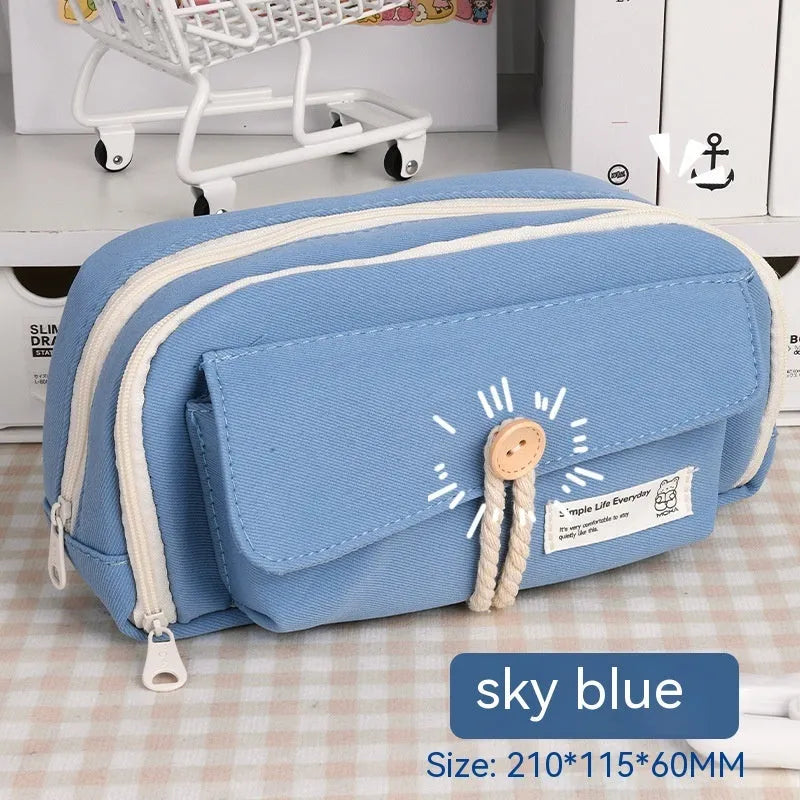 Korean style canvas pencil case in green holding multiple pens