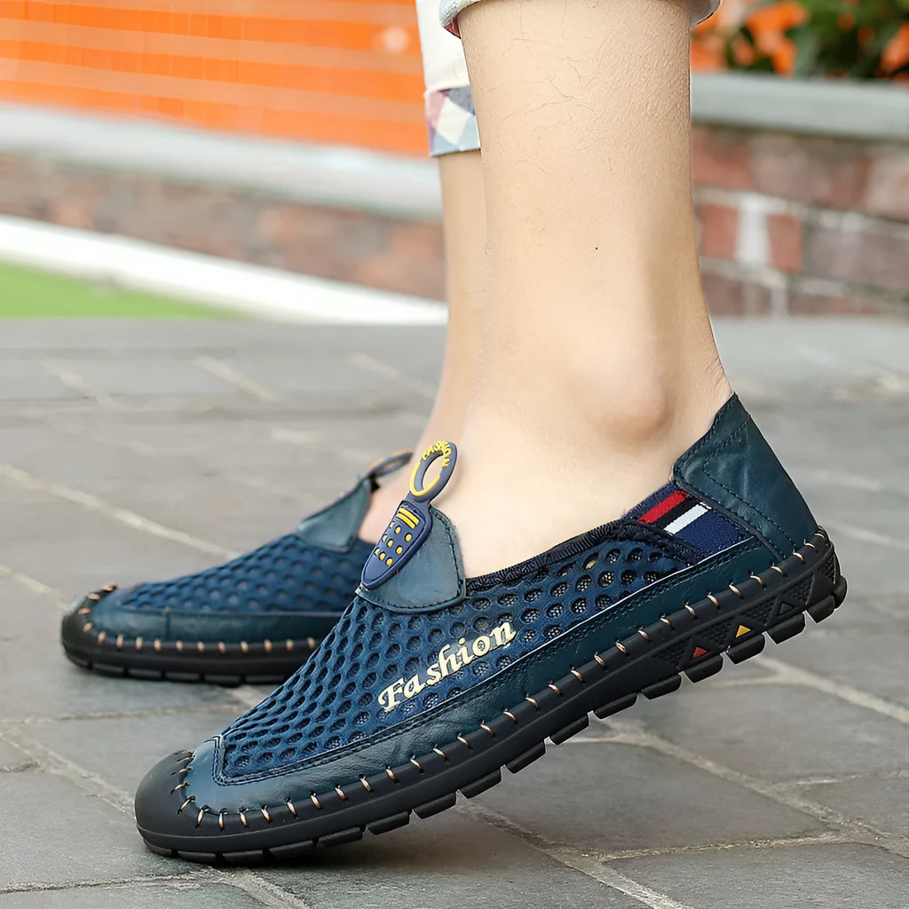Men's brown mesh casual shoes with round toe and rubber sole on grey background