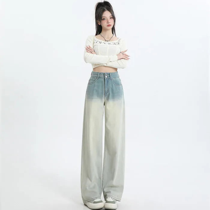 Women's gradient blue straight-leg denim trousers with wide leg design on hanger