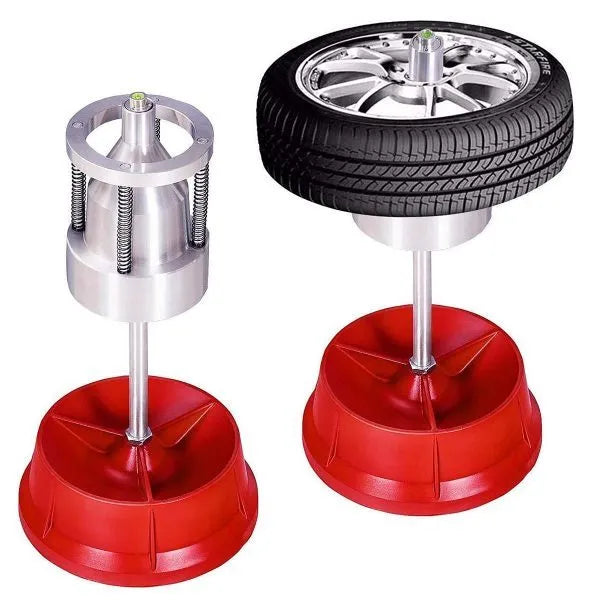 Portable aluminium hub balancer with bull's eye level on a red enamel-finished base.