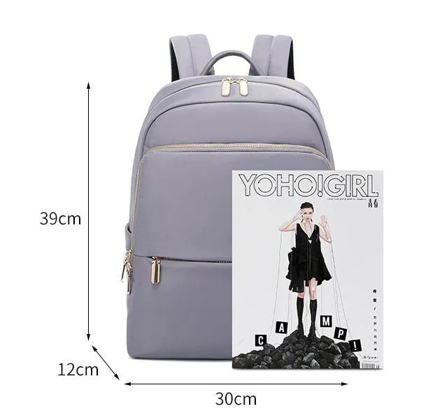 Oxford cloth women's backpack with mesh back panel and adjustable straps in black or purplish grey