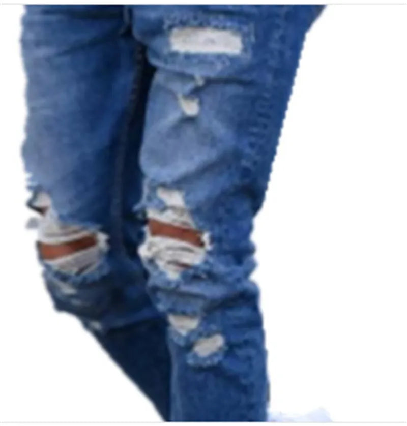 Men's deep blue jeans with distressed hole detailing on cotton denim fabric