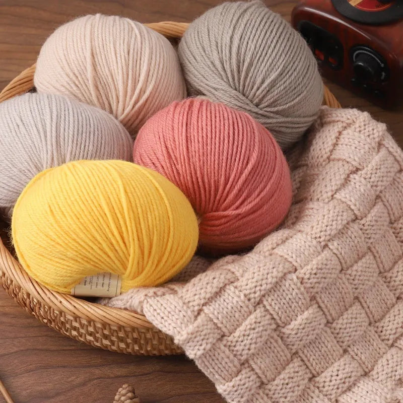 Roll of woolen knitting yarn thread for hand knitting with size 10 needles in various colour options