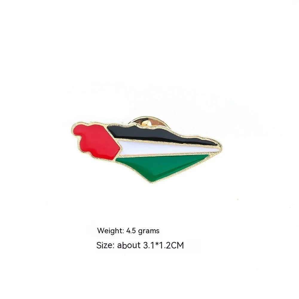 Square corrugated alloy brooch with Palestinian flag design on a neutral background