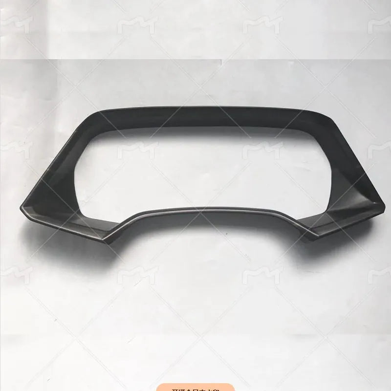 Dashboard decorative frame for BMW X5L in carbon fibre and peach wood finish options.