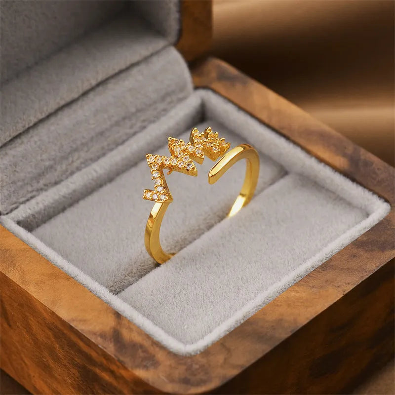 Geometric open women's ring in electroplated gold colour made from copper material