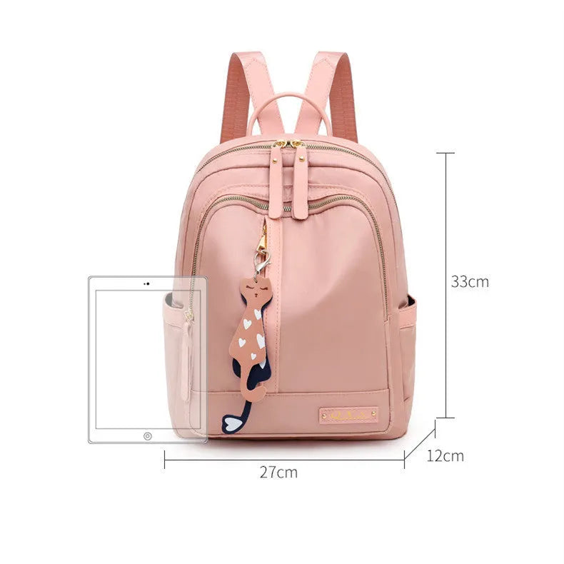 Soft nylon casual backpack in black or pink with three-dimensional pockets and double shoulder straps