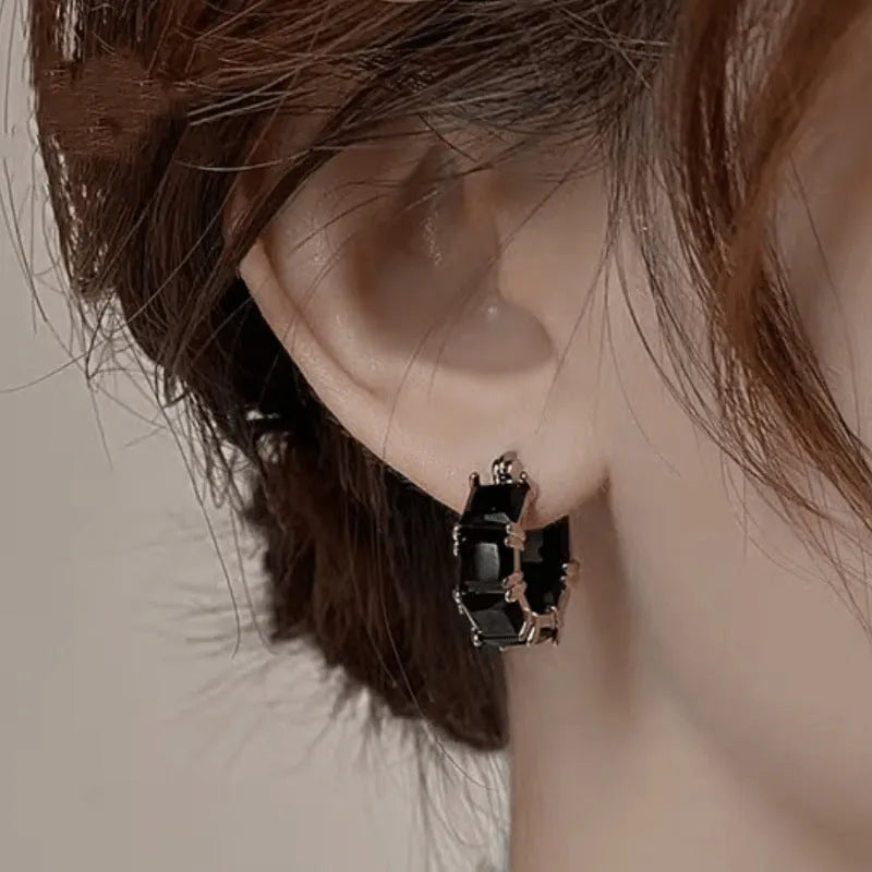 Geometric U-shaped ear rings with crystal zircon accents in black, pink, or white options