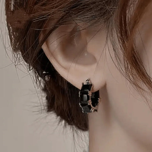 Geometric U-shaped ear rings with crystal zircon accents in black, pink, or white options