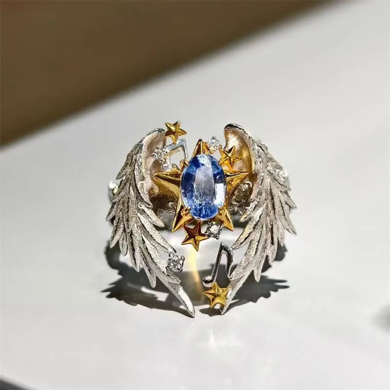 Adjustable geometric alloy ring with open mouth design and oiled finish