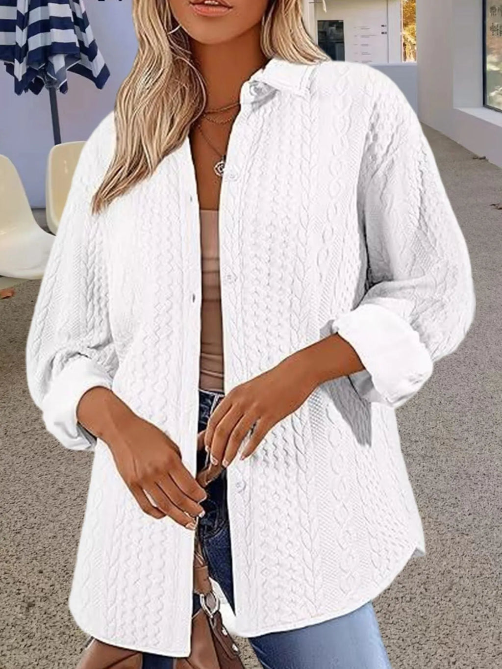 Women's solid colour long-sleeved knitted cardigan in black, shown in a cardigan style with contrast trim detail.