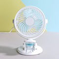 White USB desk fan with clip attachment and three blades, shown on a desk.