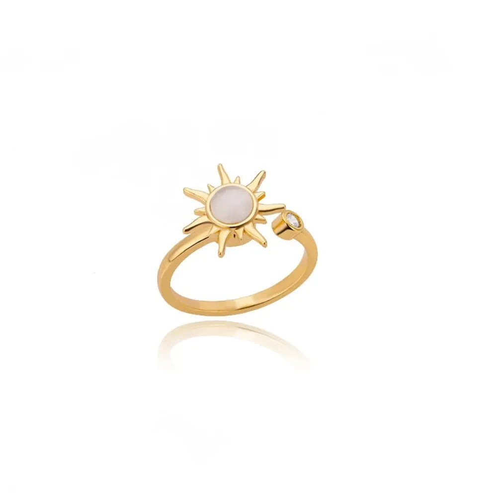 Copper rotatable decompression ring with adjustable opening in gold electroplated finish