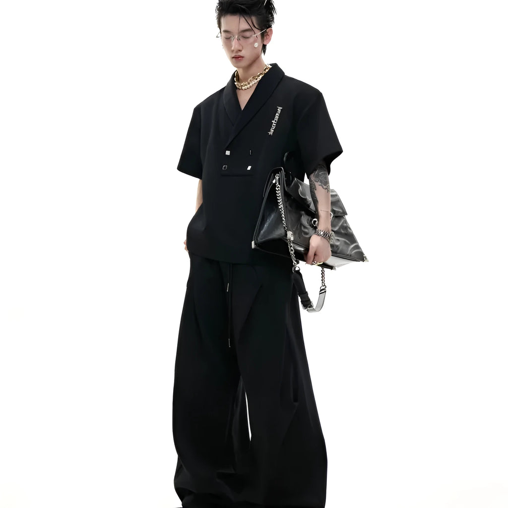 Men's dark grey cotton sports suit with padded shoulder jacket and matching shorts with metal embellishments