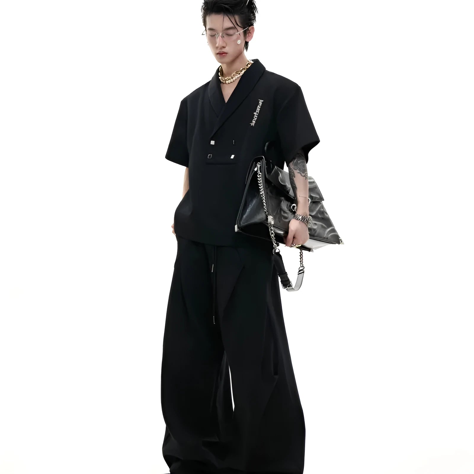 Men's dark grey cotton sports suit with padded shoulder jacket and matching shorts with metal embellishments