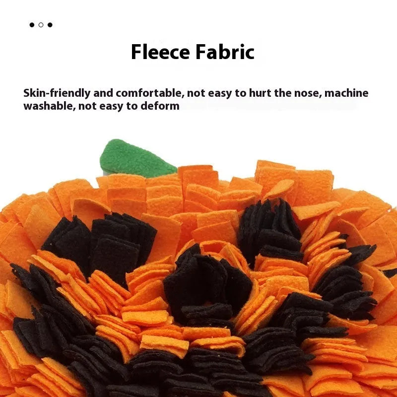 Orange polar fleece dog training mat for slow feeding and scent work, measuring 25 by 34 cm.